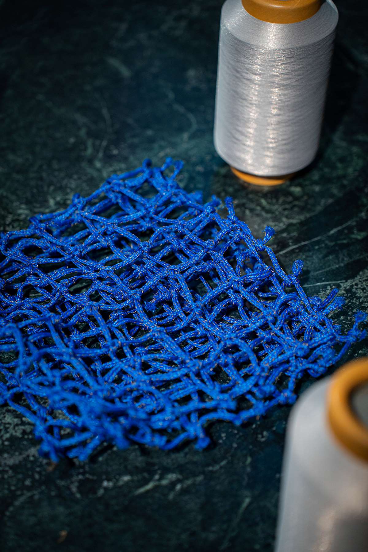 AB65 yarn from fishing nets to socks and gloves